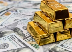 الذهب يتراجع دون 1700 دولار