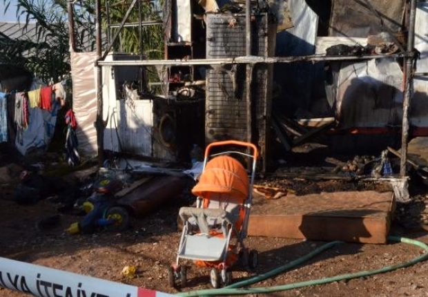 المنزل الذي احترق وتوفيت الطفلة السورية جراء ذلك - أرشيف
