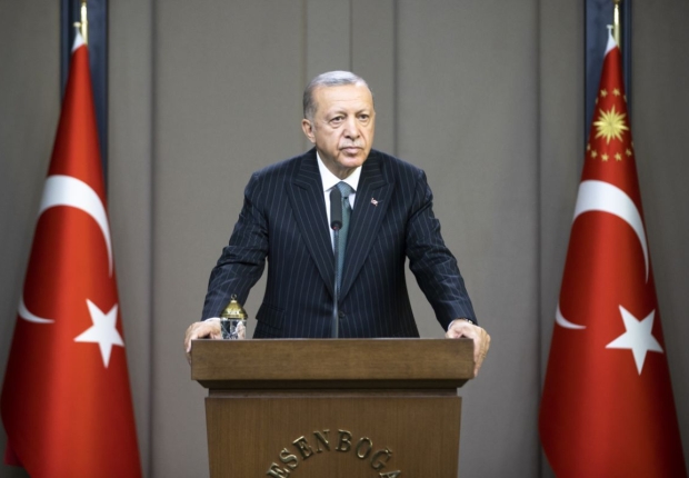 أردوغان  في مؤتمر صحفي عقده في مطار أسن بوغا بأنقرة-الأناضول