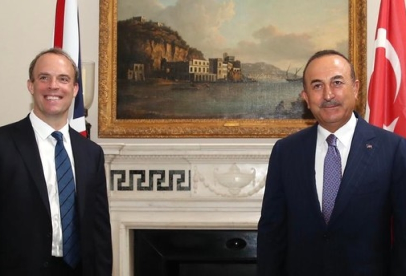 وزير الخارجية التركي مع نظيره البريطاني - وكالات
