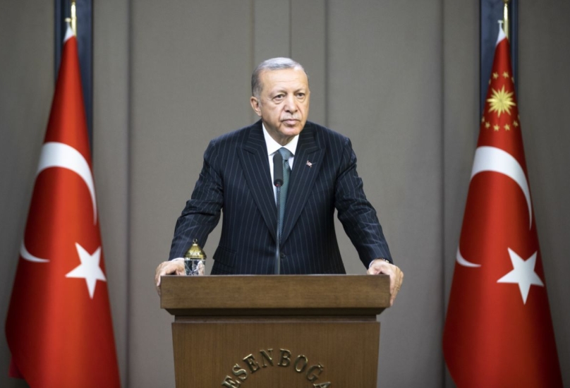 أردوغان  في مؤتمر صحفي عقده في مطار أسن بوغا بأنقرة-الأناضول